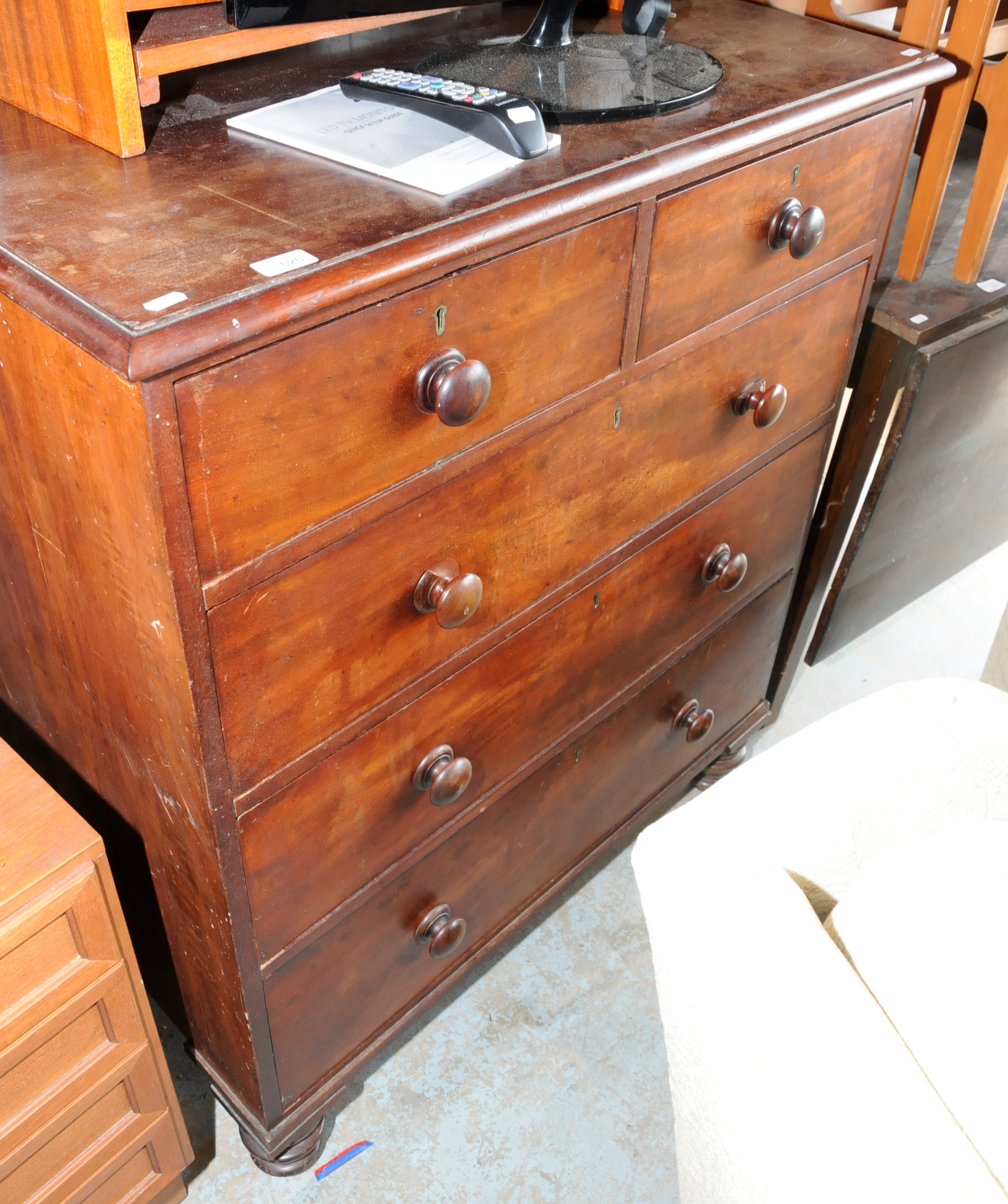 Victorian mahogany chest of two short above three long drawers on turned supports