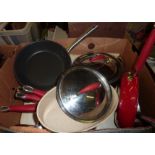 Five Kitchenaid cast saucepans and two stainless steel saucepans etc.