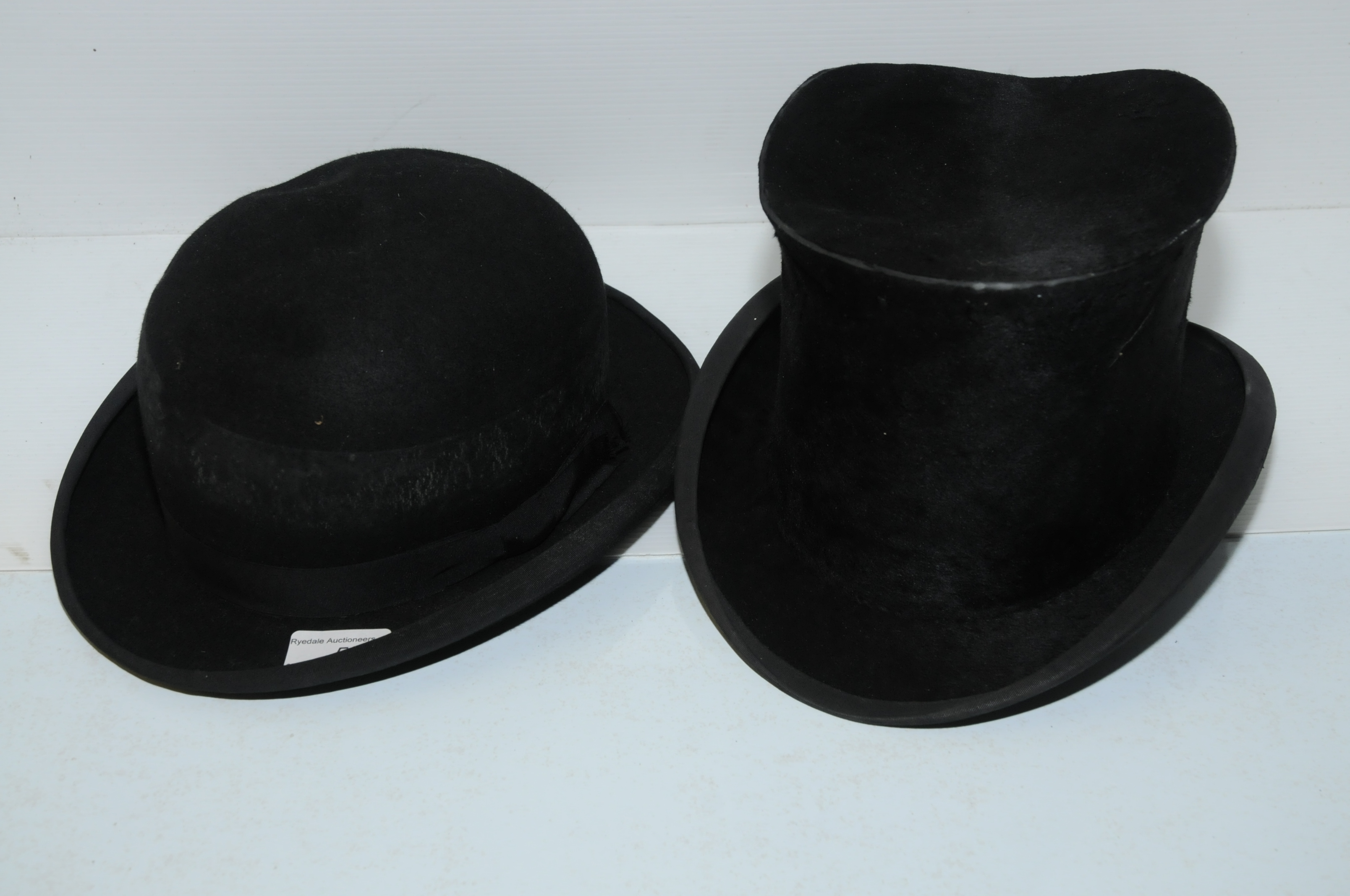 Silk top hat and Tilly's bowler hat