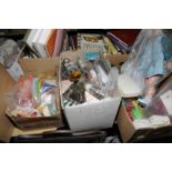 Three boxes of assorted dolls including souvenir, children's hand bags etc.