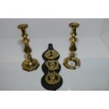 Pair of 19th C brass candlesticks and Coronation horse brasses