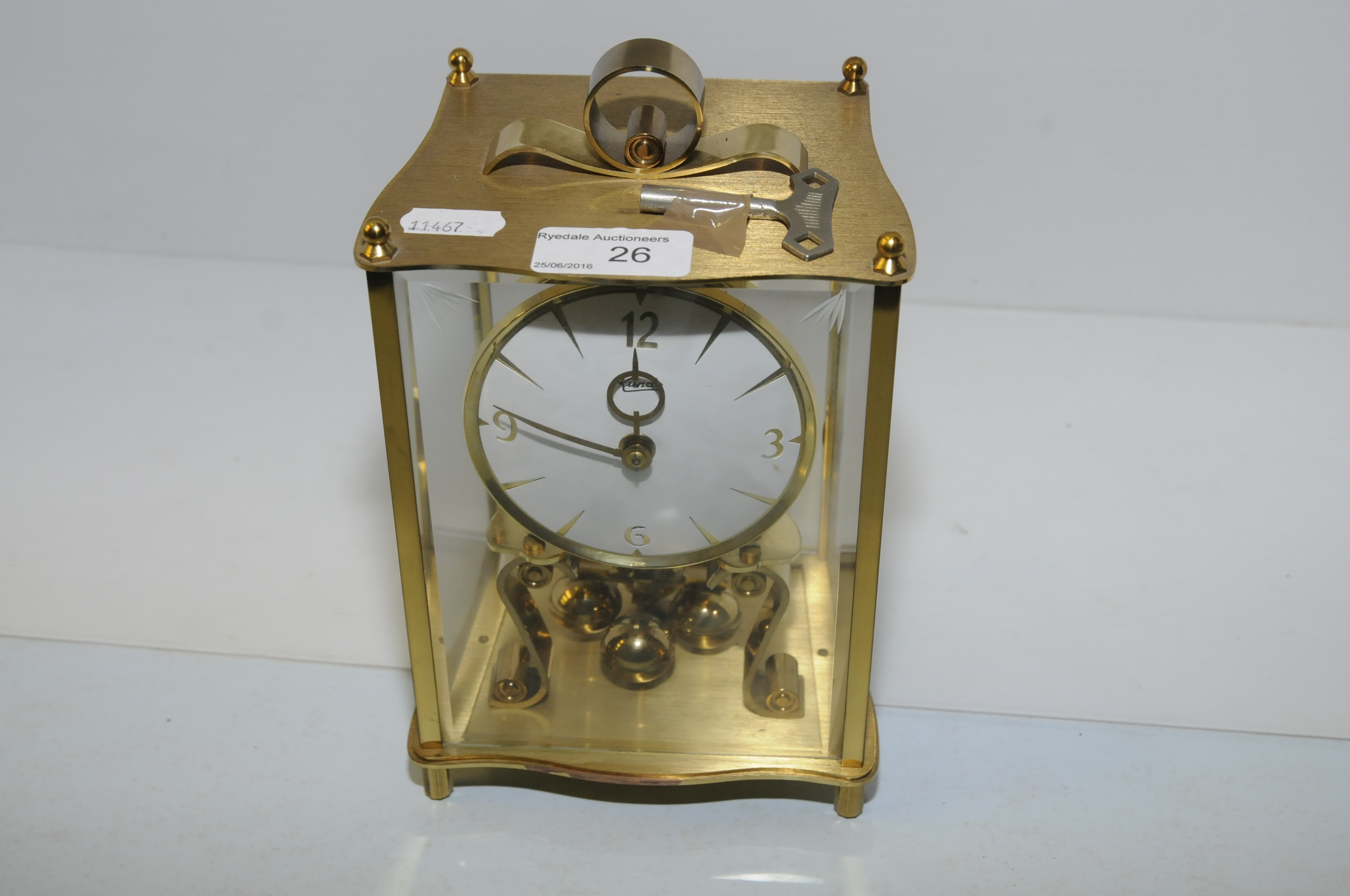 Kundo brass torsion clock