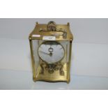 Kundo brass torsion clock