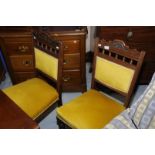 Pair of late Victorian dining chairs with upholstered seats and backs on turned supports