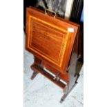 Unusual Edwardian mahogany inlaid magazine rack with two sprung sections and under tier book trough