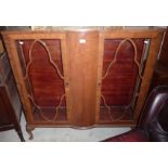 Walnut two door China cabinet