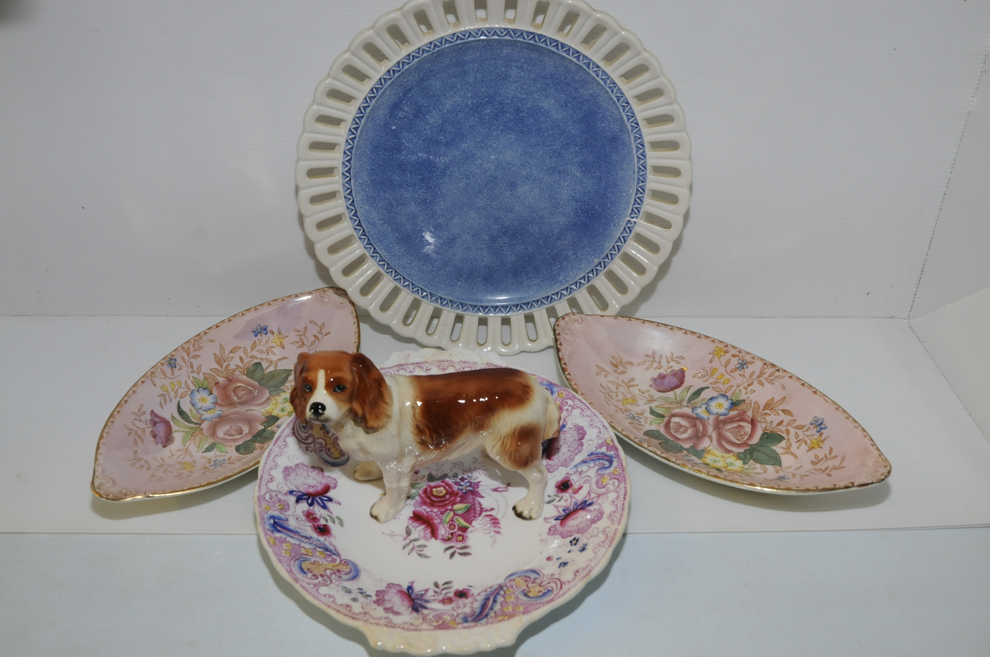 Ribbon plate and one other, two malin dishes and Beswick style spaniel etc.