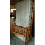 Pine framed single bed with mattress