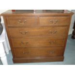 Early 20th C oak chest of two short above three long drawers with inlaid detail