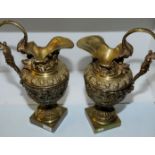 Pair of 19th/20th C large brass ewers on square bases,