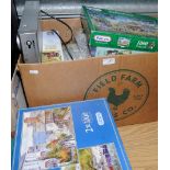Large selection of assorted jigsaws, DVD player etc.