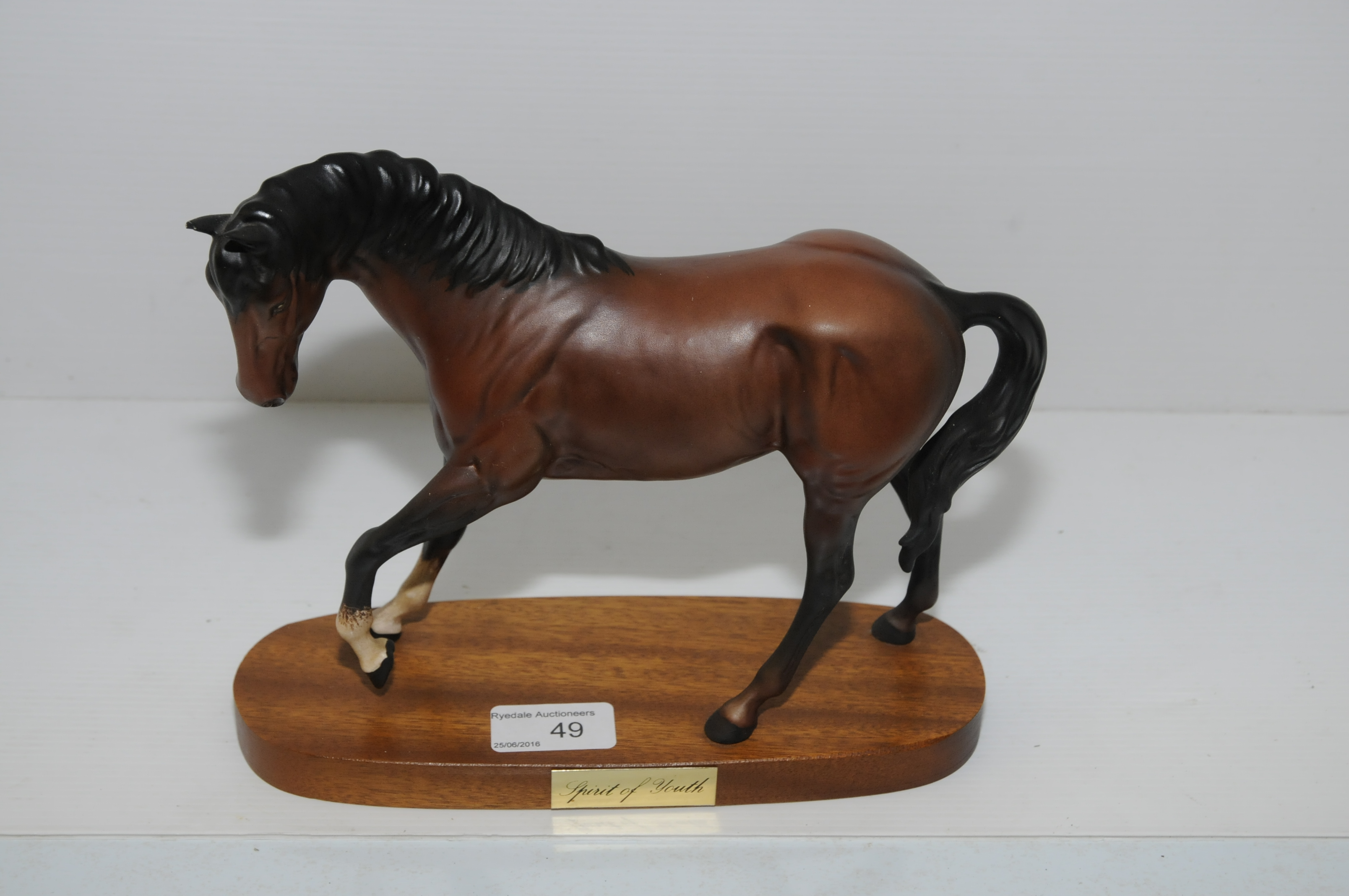 Beswick 'Spirit of Youth' on wooden plinth