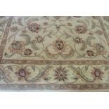 Very large beige ground Chinese style woollen rug