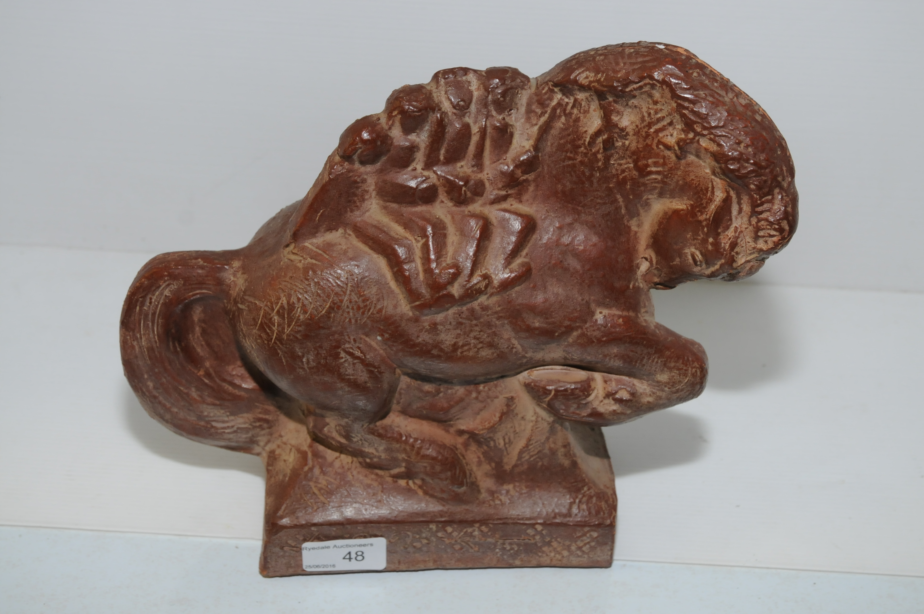 Carved terracotta Roman style horse