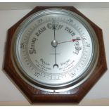 Octagonal oak framed barometer with steel face