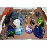 Selection of glass paperweights, ship in a bottle etc.