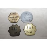 Four railway pay tokens including LNE No.