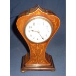 Edwardian mahogany inlaid balloon mantel clock with white enamel dial on four raised gilt metal bun