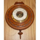 Satinwood barometer with carved border 'Presented By The County And farmers Insurance Offices York