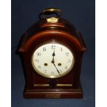 Mahogany cased striking bracket clock with arch top and white enamel dial with gilt mounts and