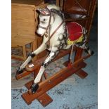 Lions carved and painted wooden rocking horse
