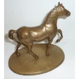 Brass model of a horse on oval brass base
