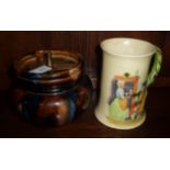 Mottled glazed tobacco style jar and a Crown Devon Fielding's tankard (2)