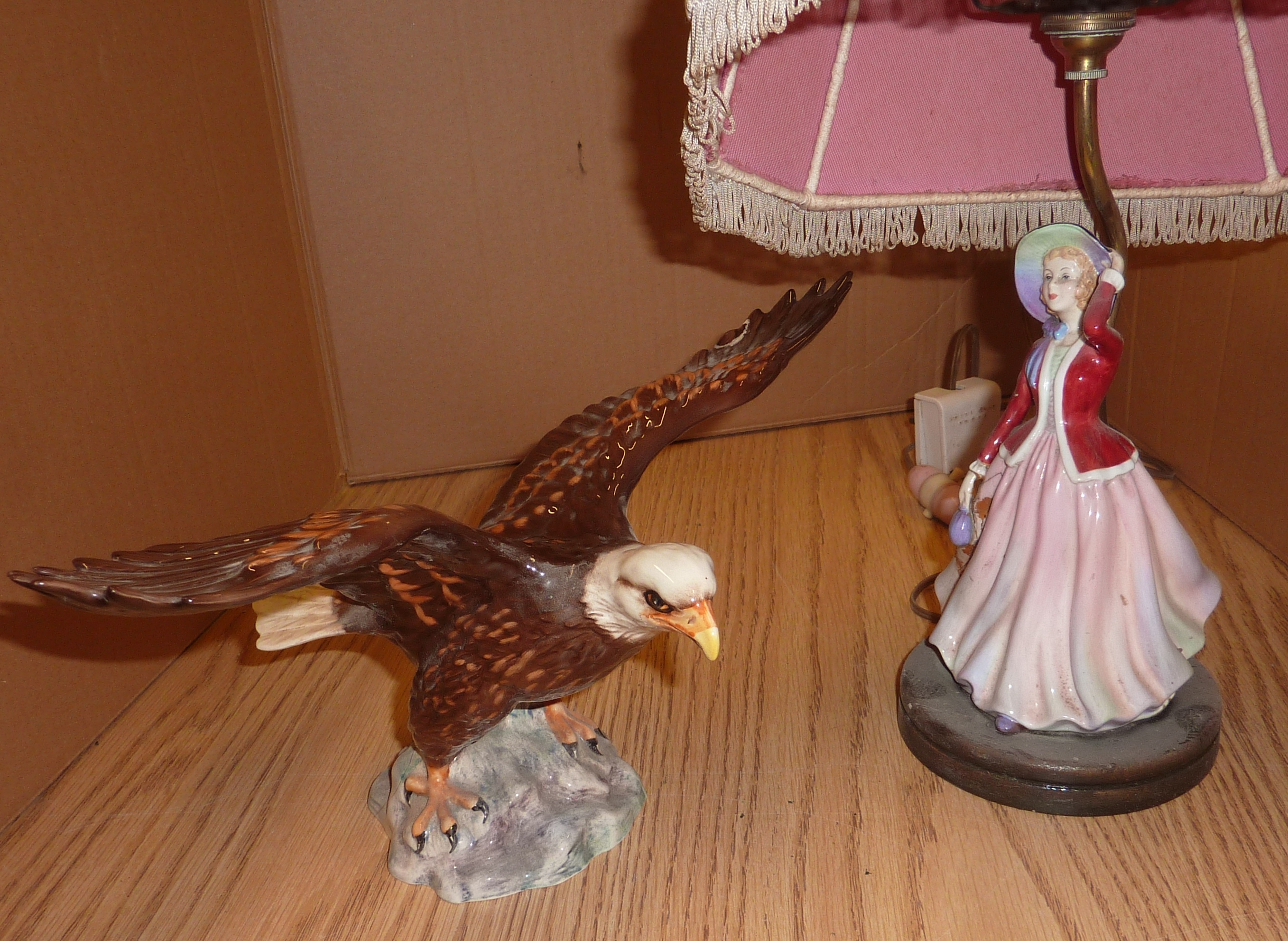 Royal Doulton figurine lamp and Beswick bald eagle 1018 (a/f)