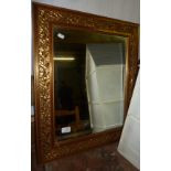 Gilt framed bevel edged wall mirror