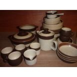 Large selection of Denby tableware comprising dinner plates, tea plates, cups, saucers, dishes,