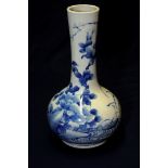 Japanese blue and white bottle neck vase depicting various foliage with nine digit signature panel