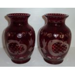 Pair of ruby glass baluster vases with etched cut design