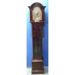 Mahogany cased grandmother clock with arched pediment and steel face with presentation plaque
