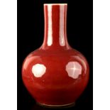 A Chinese flambe glazed bottle vase, probably 19th century, 13.6ins. (34.5cms.) high (see
