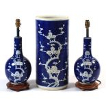 Property of a deceased estate - a pair of Chinese blue & white prunus bottle vases, with 'cracked