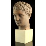 Property of a gentleman - a large modern pottery head of a Roman Emperor, on white plinth, 19.25ins.