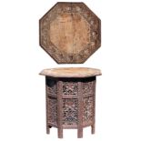 Property of a gentleman - a late 19th century Indian carved walnut octagonal occasional table, on