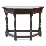 Property of a deceased estate - an oak side table, parts 17th century, with angled top & turned