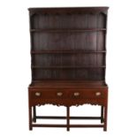 Property of a lady - a George III oak two-part Welsh dresser, of small size, with three-tier plate-