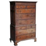 Property of a gentleman - a George III oak two-part tallboy or chest-on-chest, with fielded panelled