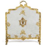 Property of a gentleman - a French Louis XV style gilt brass & mesh spark guard, 31.9ins. (81cms.)