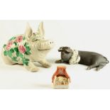 Property of a lady of title - a raku model of a recumbent pig, indistinctly signed, 12.6ins. (