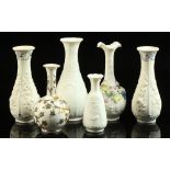 Property of a lady - five Victorian parian vases with relief moulded decorations, the tallest 7.