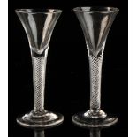 Property of a lady - a pair of late 18th century George III clear air-twist wine glasses, 6.7 and