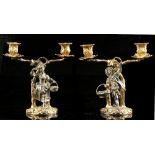 A fine pair of Asprey silver & silver gilt candelabra modelled as an eighteenth century lady &