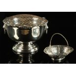 Property of a lady - a small George silver pierced oval basket with swing handle, makers W.C, London