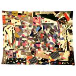 Property of a lady - a patchwork quilt, probably early 20th century, with black cotton backing, 75.5