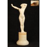 Louis Sosson (fl.c.1905-1930) - A MAIDEN AWAKENING - a good Art Deco carved ivory figure, mounted on
