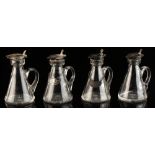 Property of a lady - a set of four early 20th century silver topped whisky noggins, makers Hukin &