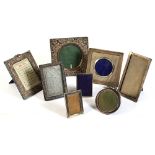 Property of a deceased estate - a group of eight silver photograph frames, all early 20th century,